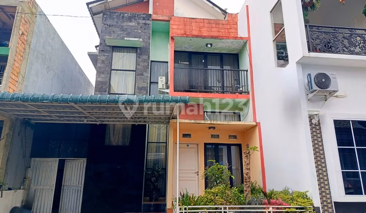 Rumah lelang Palembang