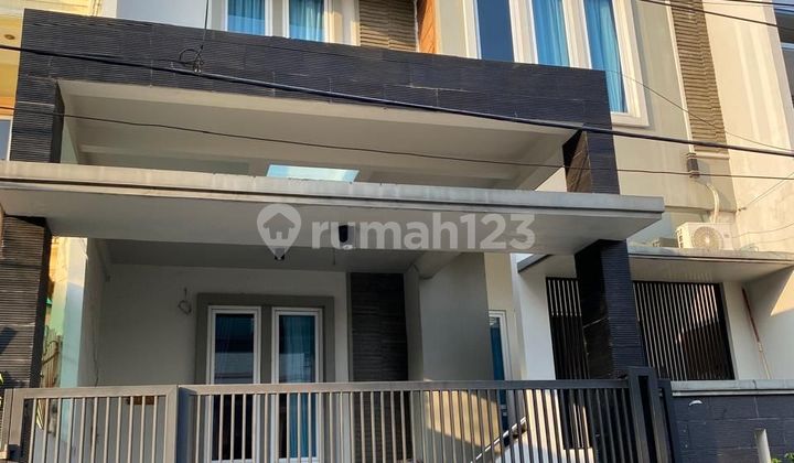 Rumah Modern Bangunan 2014 Di Green Garden Jakarta Barat - foto 1
