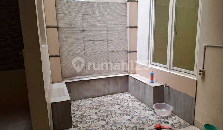 Rumah 2,5 Lantai Lebar 8 Cluster Amerika Green Lake City - foto 1