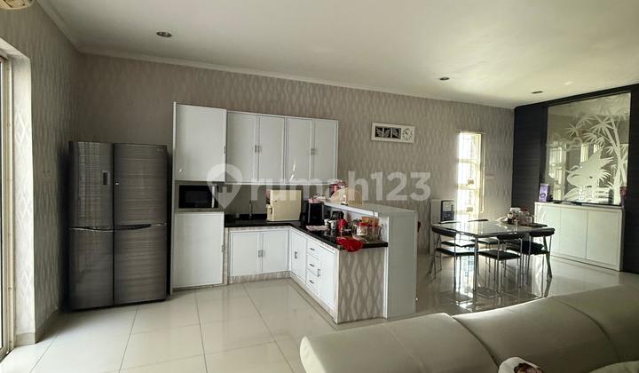 Rumah 2 Lantai Hoek di Puri Mansion Bolevard Hadap Selatan - foto 1